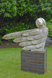 Angel, Portland limestone (re-used), on a brick base.